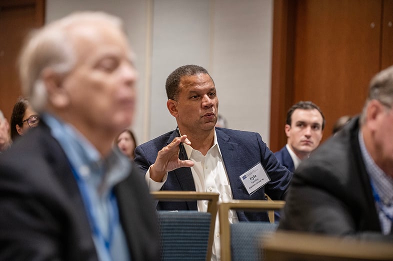 Six photos: Various audience members and participants at the Institute for Chief Academic Officers and the Presidents Institute asking questions or listening at sessions