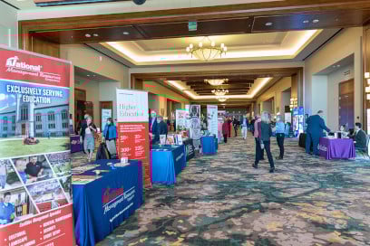 Exhibit hall at the conference hotel with booths and displays