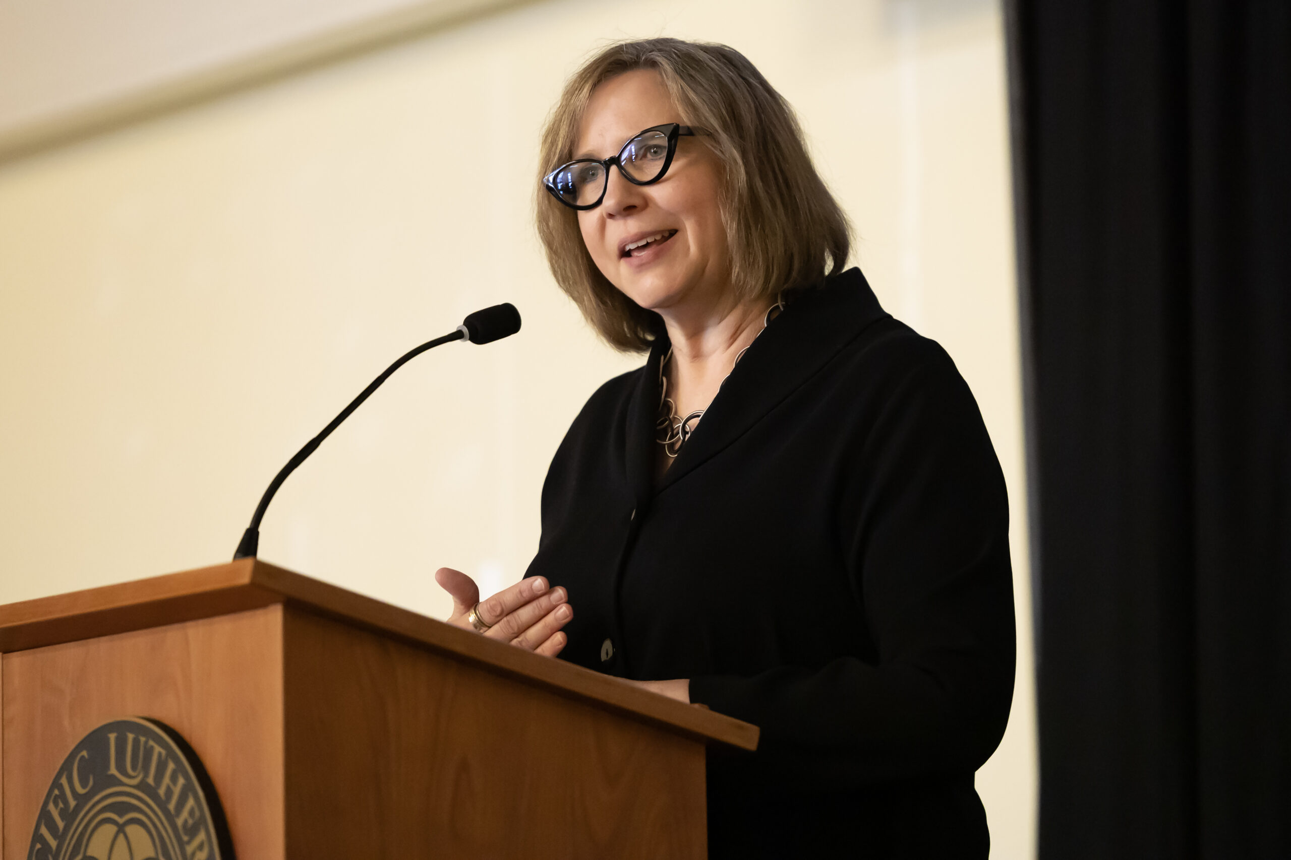 A speaker presents during the 2025 NetVUE regional gathering at Pacific Lutheran University.