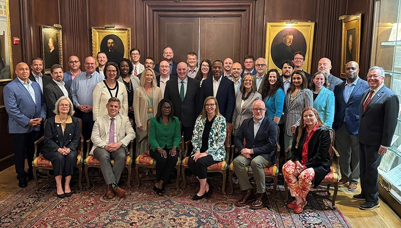 Group photo of ELA participants seated and standing in rows