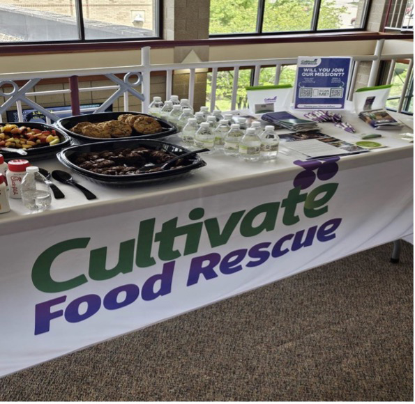 Cultivate Food Rescue table with food and drinks