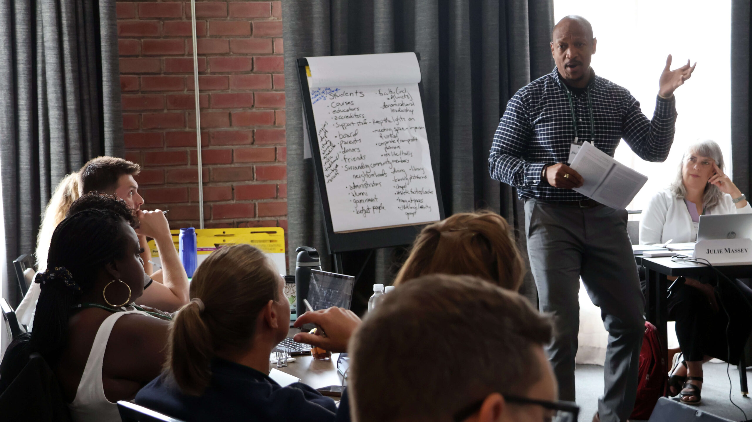 Seminar leader Richard Sévère speaking to participants of the 2025 Vocation Across Campus seminar
