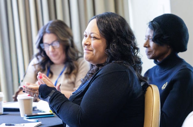 Three seated participants during session