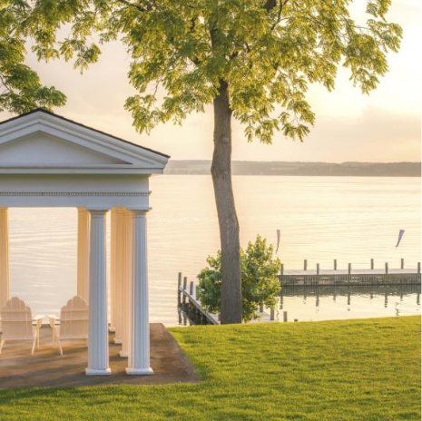 View of pavilion, lake, and dock at the Inns of Aurora
