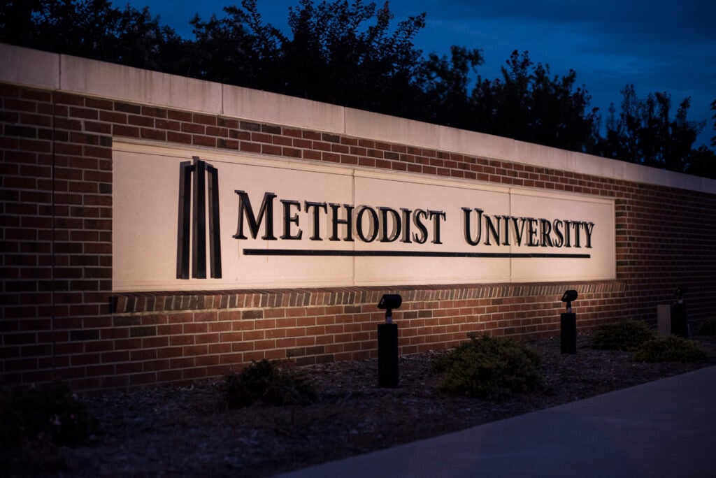 Methodist University sign on campus